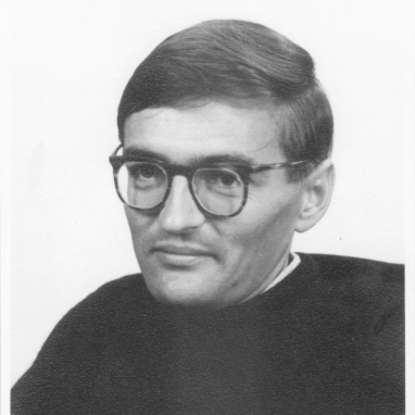 Black and white photo of man with glasses